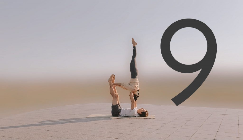 Family lesson 9 cover, Marie in shoulder stand on Tomas' hands
